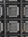EPC2TI32N of Altera microchips on a black grid background
