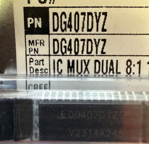 Electronic component with label showing part number DG407DYZ and description IC MUX DUAL 8:1.