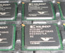 Xilinx chips with visible model numbers and branding on a metallic surface