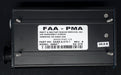 Black electronic module with FAA-PMA label on a dark background