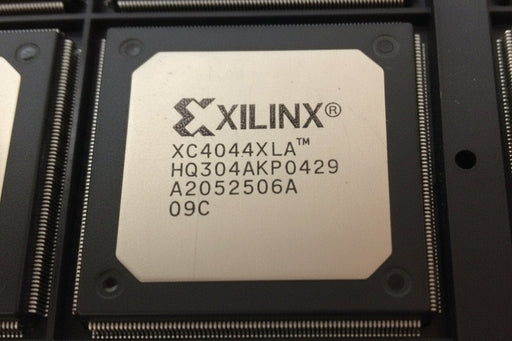 XC4044XLA-09HQ304C Xilinx FPGA chip with model number on a black background